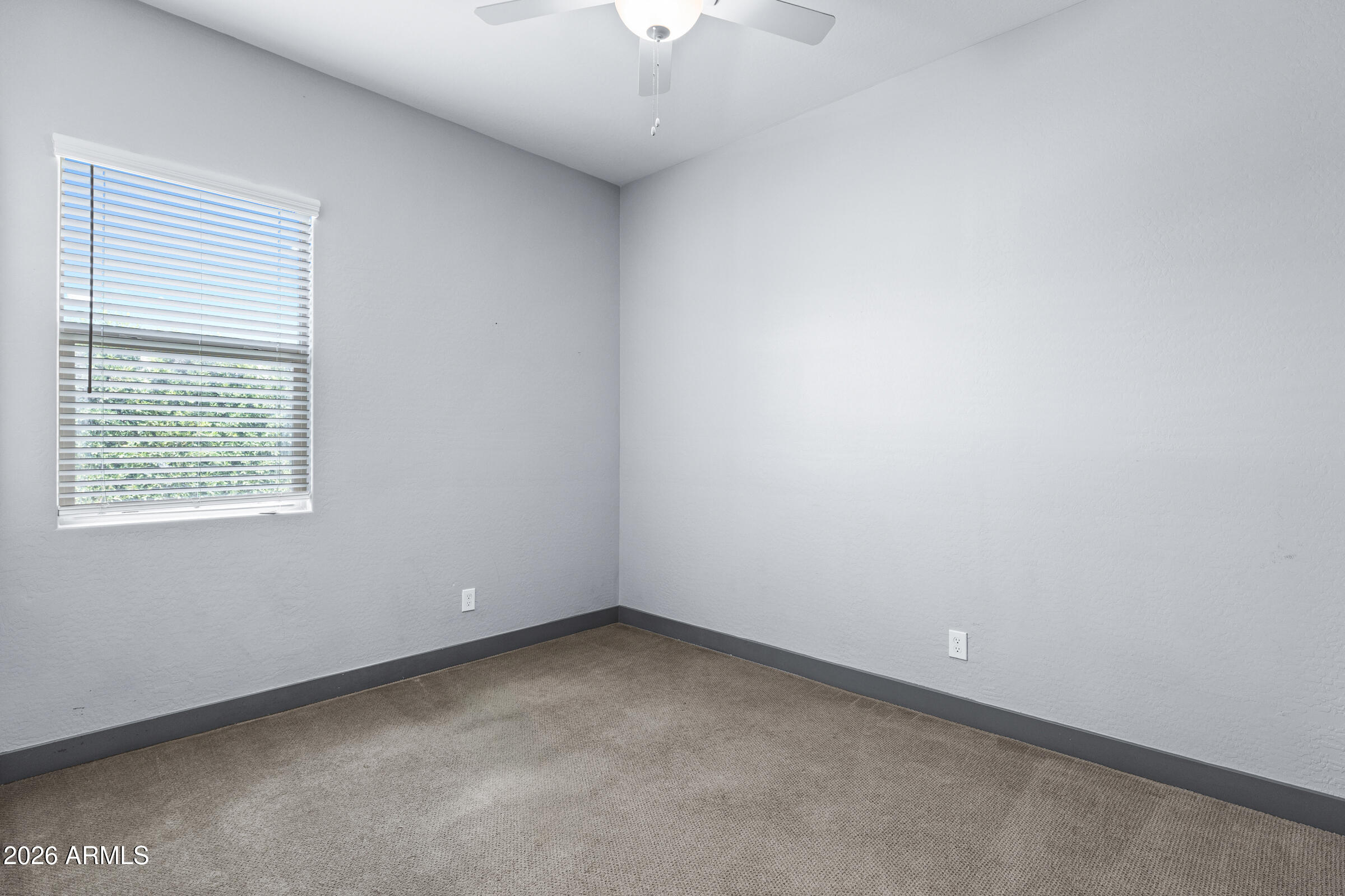 3900 East Appaloosa Road Gilbert, AZ 85296 - Photo 29 of 38 an empty room with a window