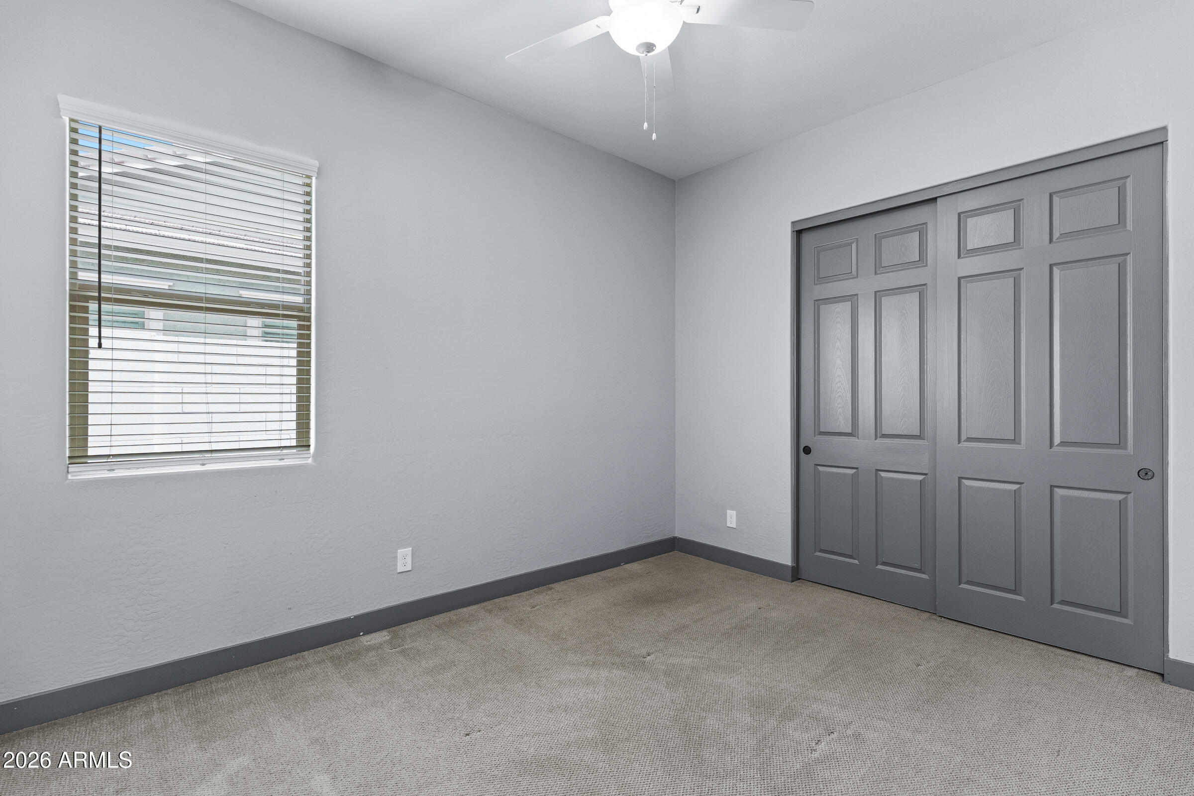 3900 East Appaloosa Road Gilbert, AZ 85296 - Photo 32 of 38 a view of an empty room with a window