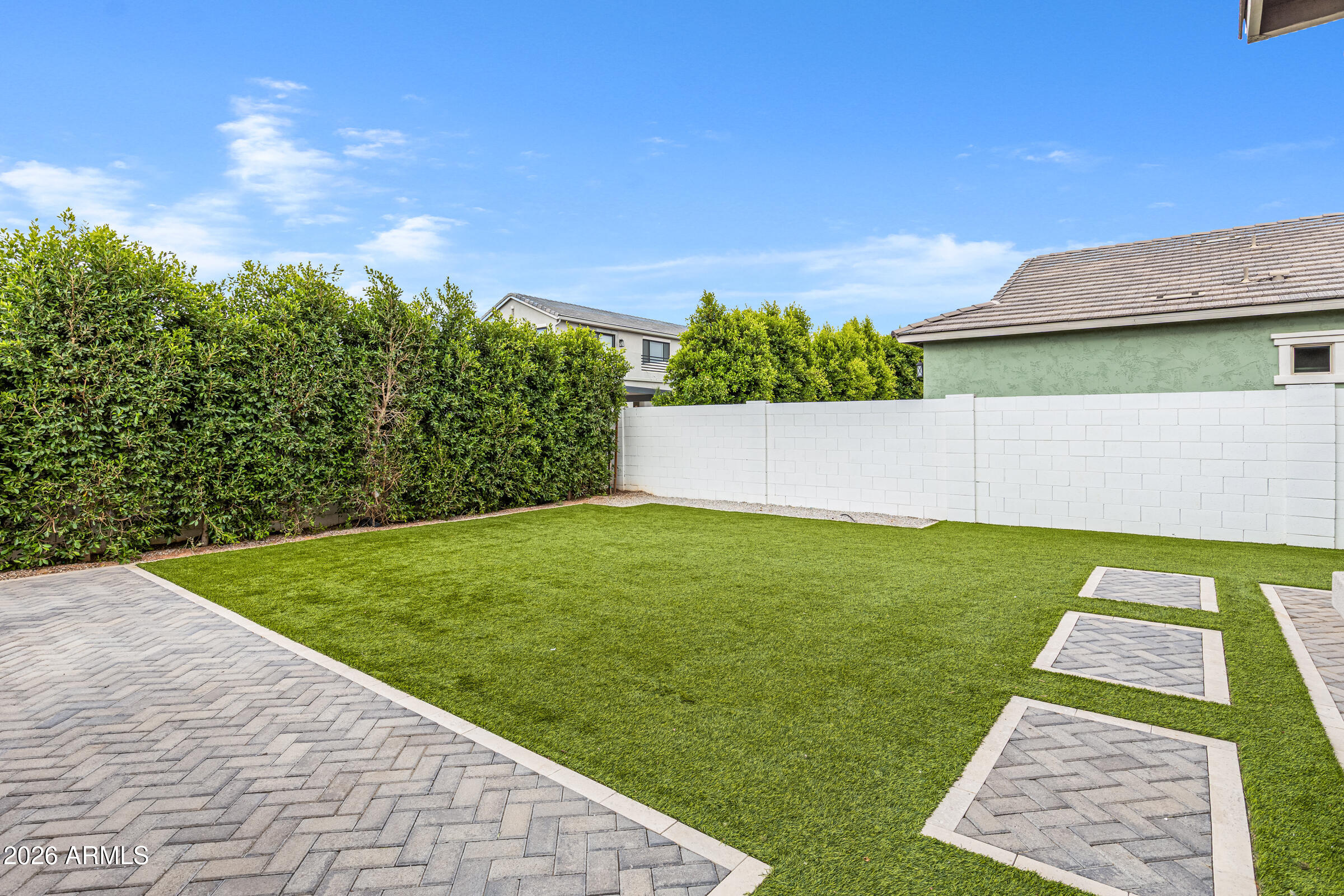 3900 East Appaloosa Road Gilbert, AZ 85296 - Photo 36 of 38 a view of a yard with an outdoor space