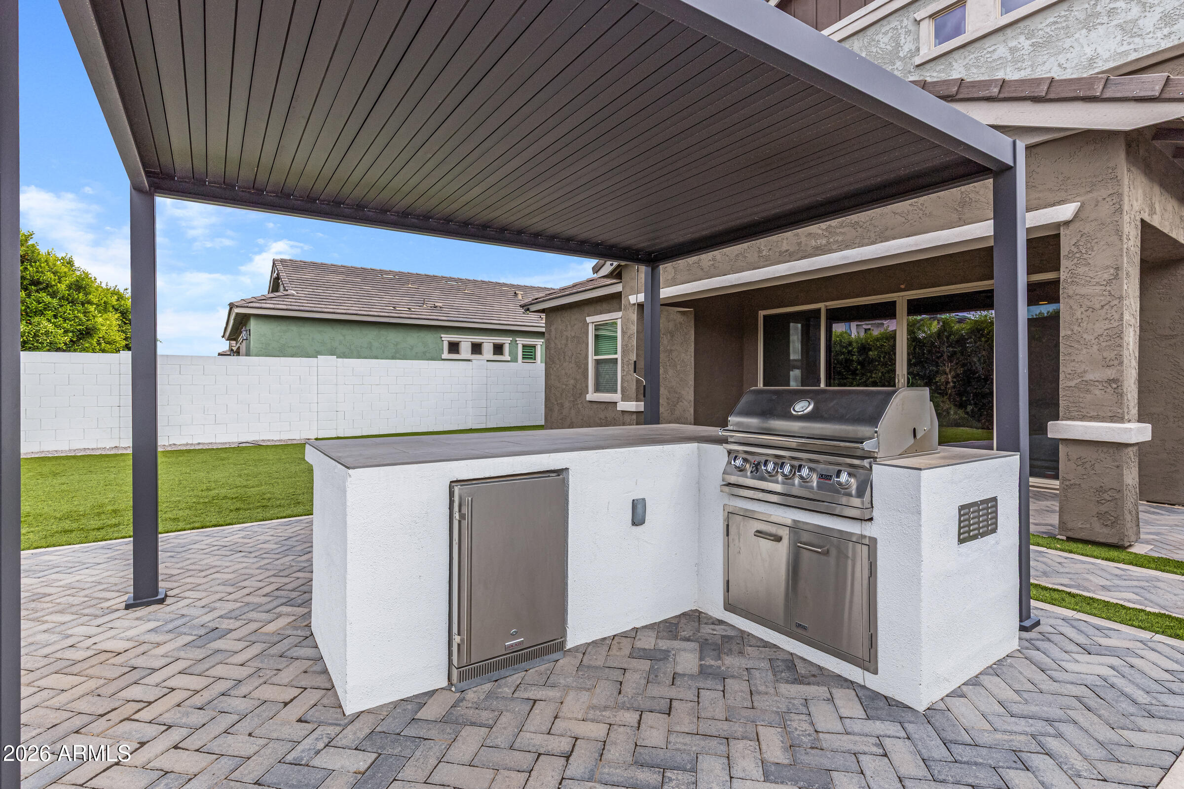 3900 East Appaloosa Road Gilbert, AZ 85296 - Photo 38 of 38 a kitchen with a stove and a sink