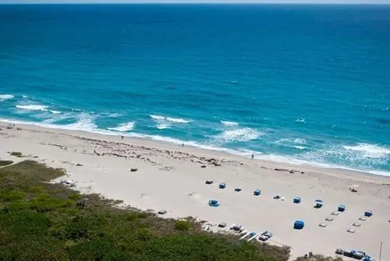 a view of a hallway with dining area