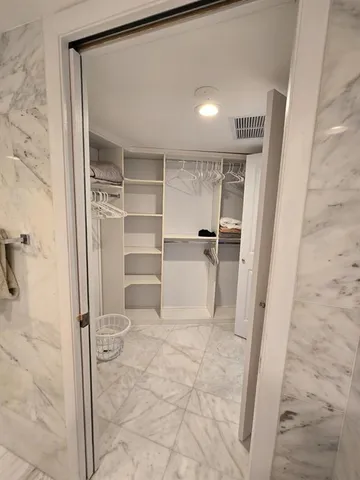 a room with a table and chairs