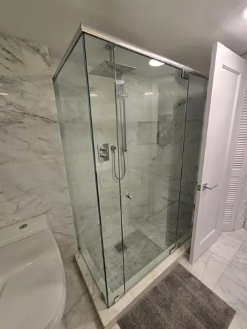 a living room with a table and chairs