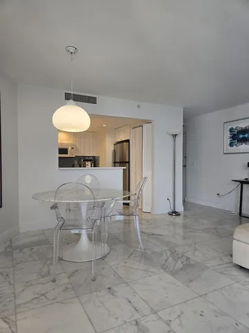 a kitchen with appliances cabinets and a sink