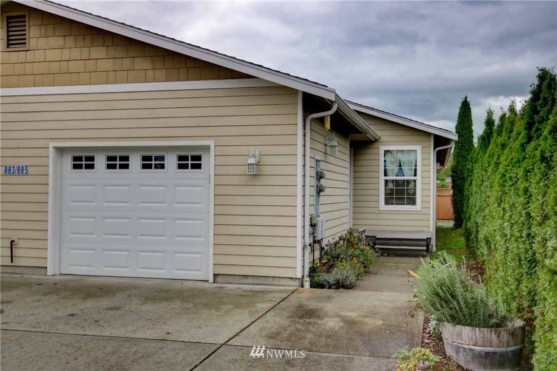 885 Cook Road, Unit 6 Sedro-Woolley, WA 98284 - Photo 1 of 31 a view of a house with garage