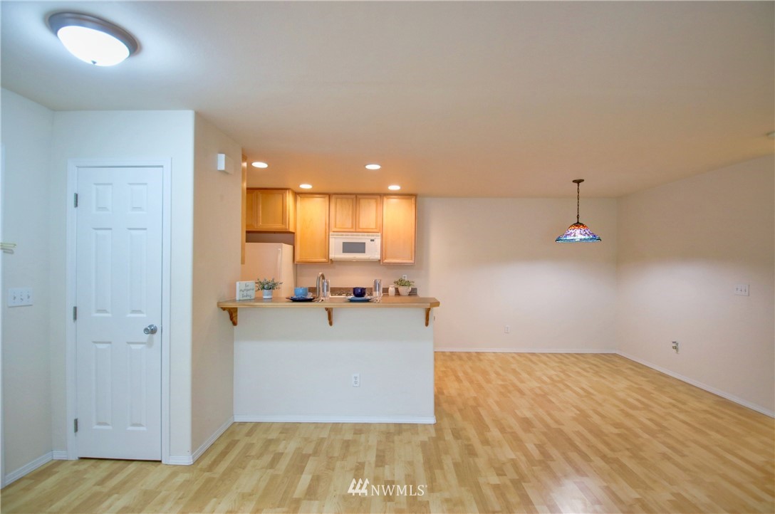 885 Cook Road, Unit 6 Sedro-Woolley, WA 98284 - Photo 8 of 31 a view of a kitchen with wooden floor