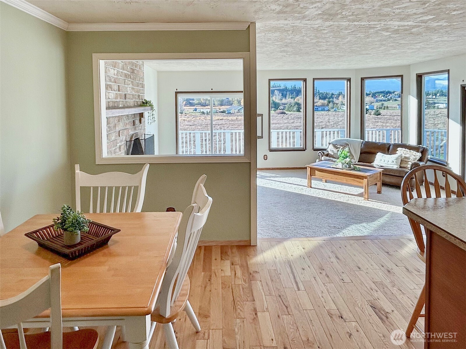 62 Hogback Road Sequim, WA 98382 - Photo 15 of 40 a living room with furniture and a wooden floor