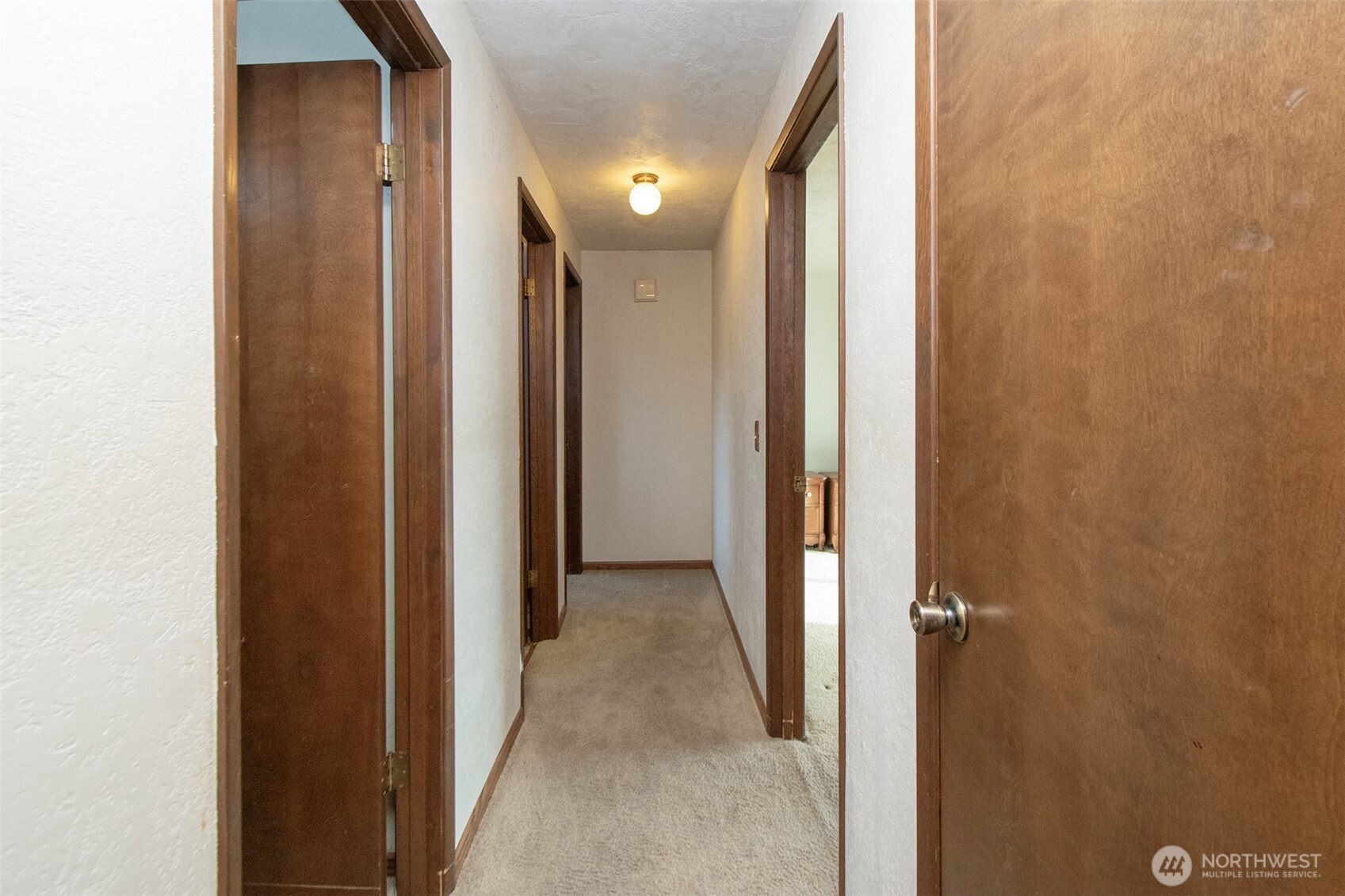 62 Hogback Road Sequim, WA 98382 - Photo 16 of 40 a view of a hallway with a elevator