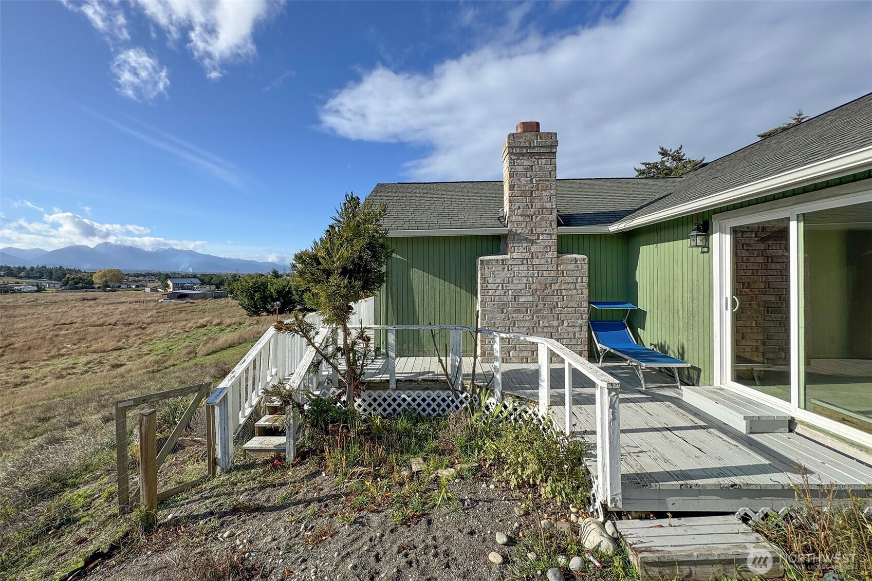 62 Hogback Road Sequim, WA 98382 - Photo 27 of 40 a view of a house with a patio