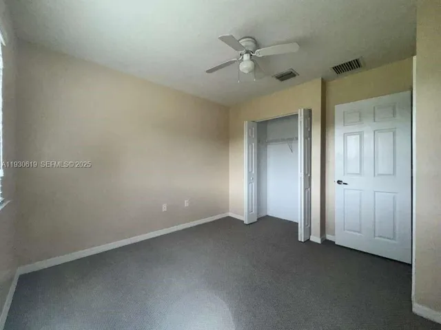an empty room with a bathroom