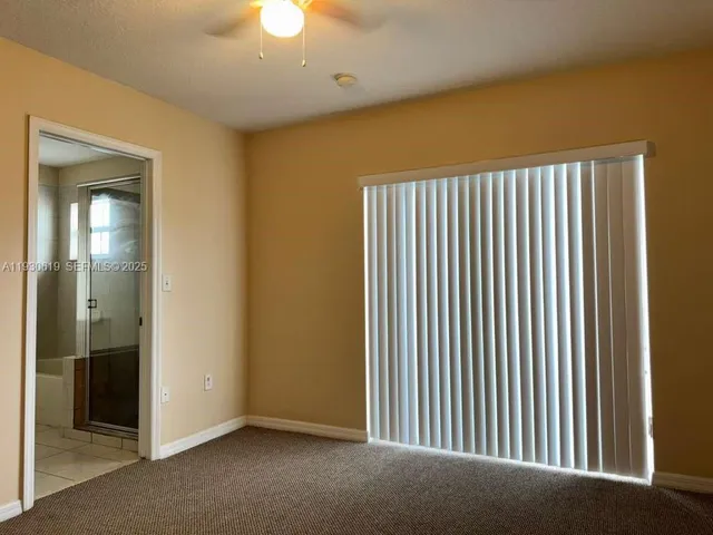 a view of a room with a mirror