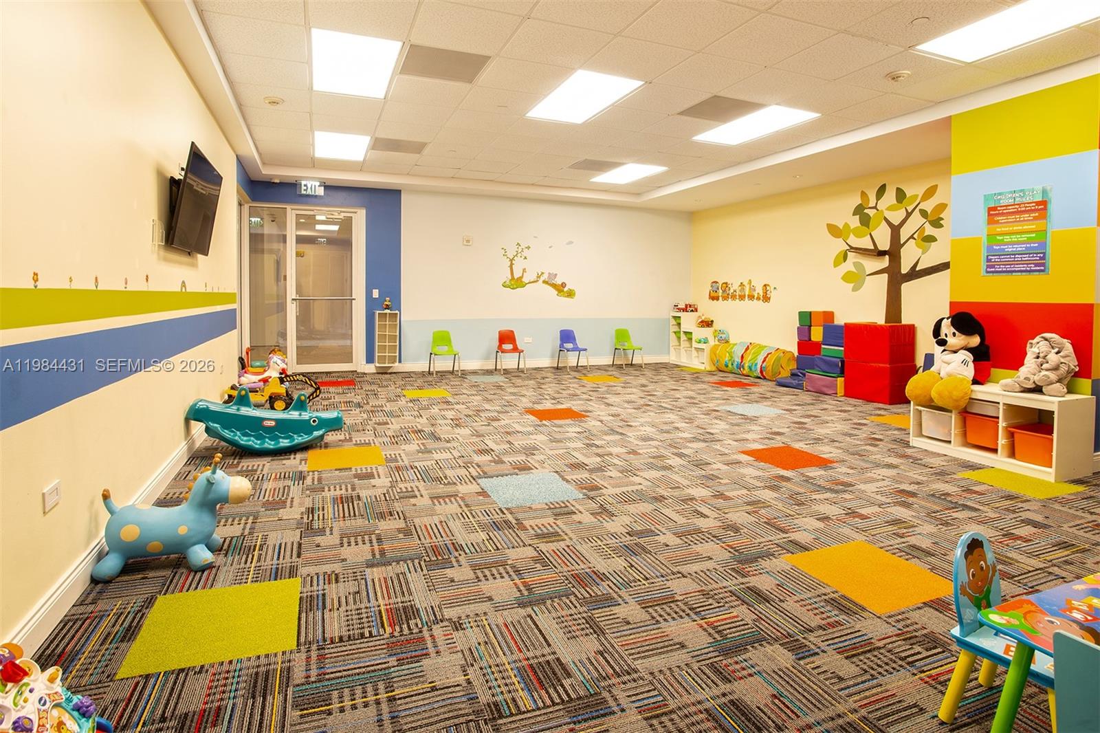 801 Brickell Key Boulevard, Unit 907 Miami, FL 33131 - Photo 39 of 53 a view of a swimming pool with a patio and dining space