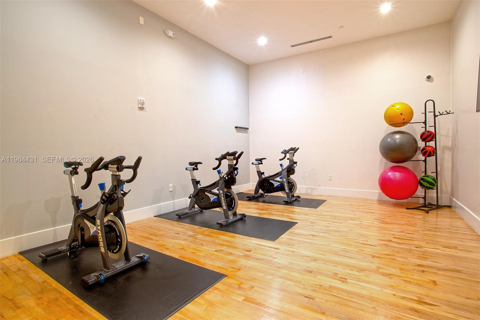 801 Brickell Key Boulevard, Unit 907 Miami, FL 33131 - Photo 41 of 53 a view of a room with gym equipment