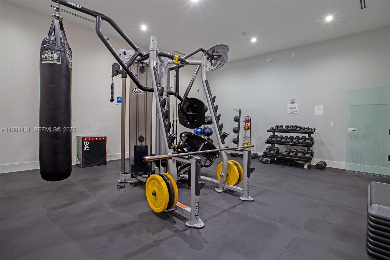 801 Brickell Key Boulevard, Unit 907 Miami, FL 33131 - Photo 42 of 53 a view of a room with gym equipment