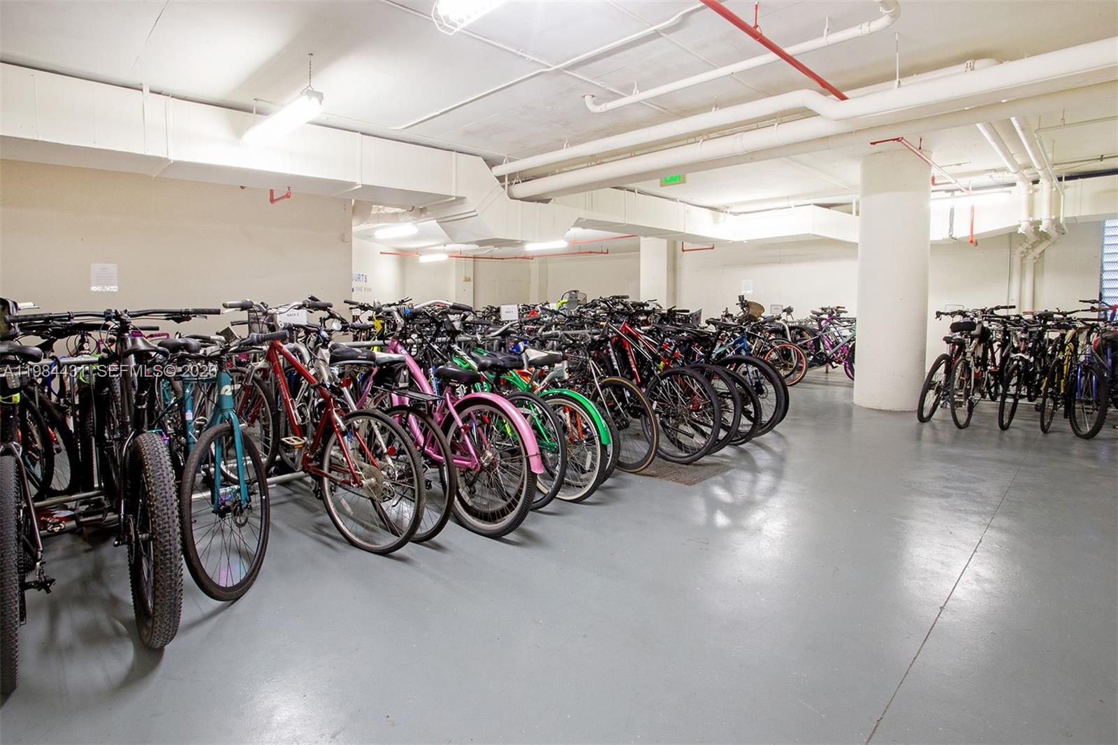801 Brickell Key Boulevard, Unit 907 Miami, FL 33131 - Photo 48 of 53 a view of a bike storage with bicycles