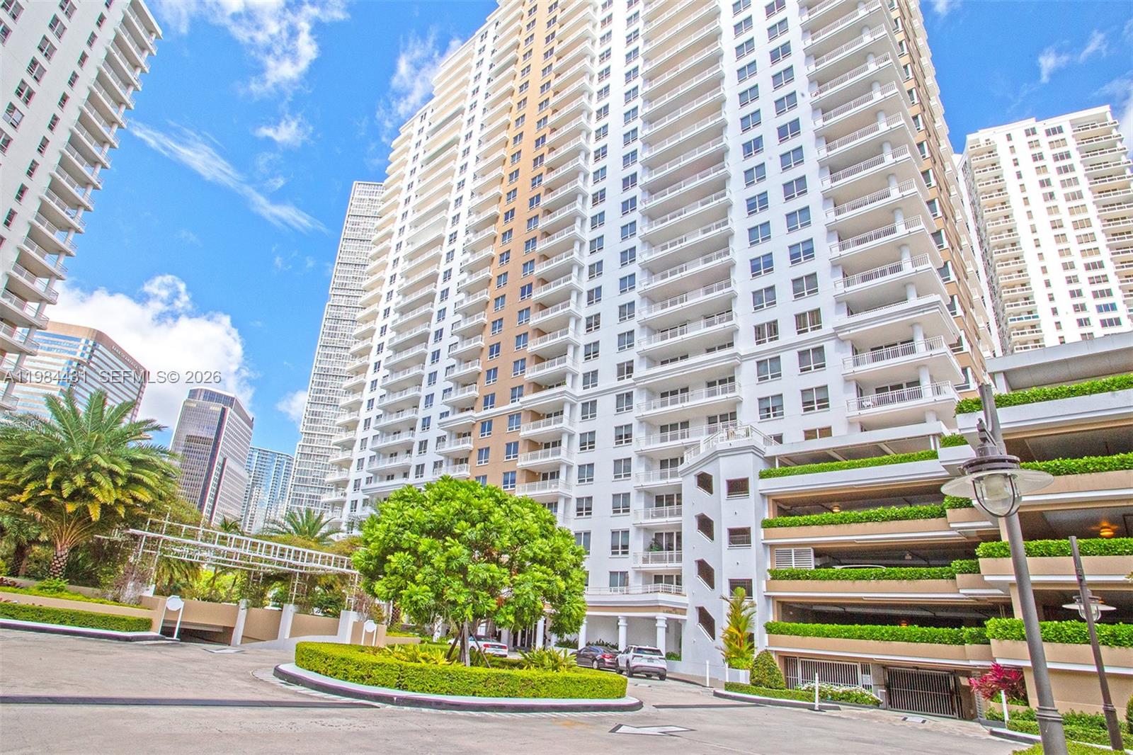 801 Brickell Key Boulevard, Unit 907 Miami, FL 33131 - Photo 52 of 53 a front view of a multi story building