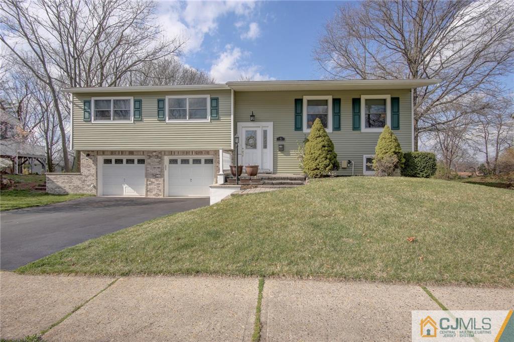 5 McEvoy Road Edison, NJ 08837 - Photo 2 of 22 a view of a house with a yard