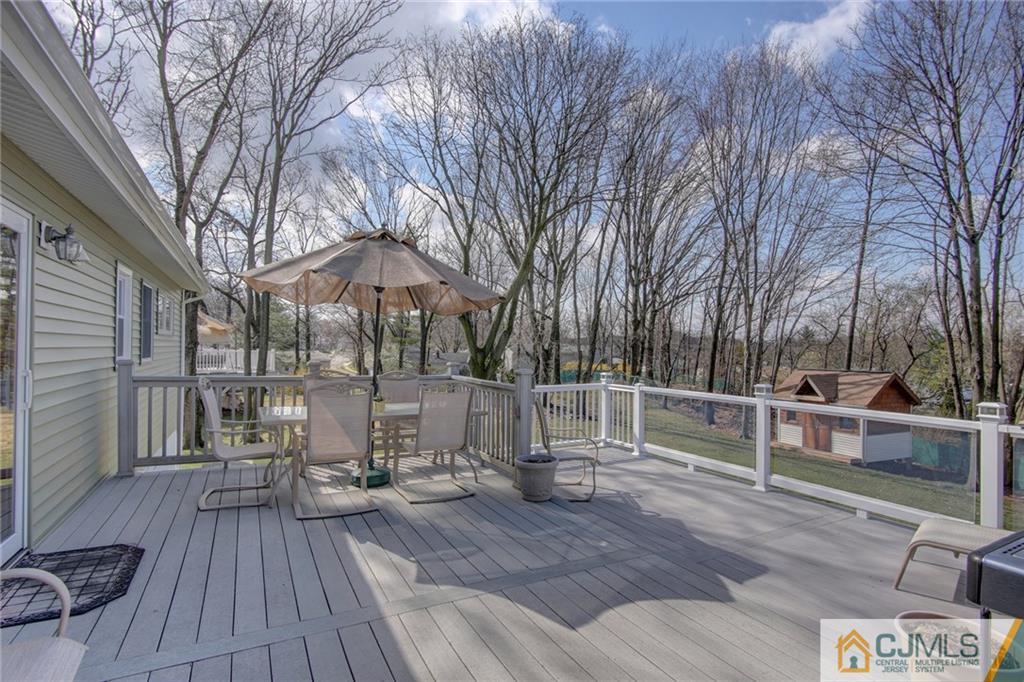 5 McEvoy Road Edison, NJ 08837 - Photo 19 of 22 a view of house with deck and outdoor space