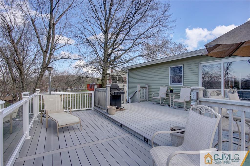 5 McEvoy Road Edison, NJ 08837 - Photo 20 of 22 a view of a patio with a table and chairs