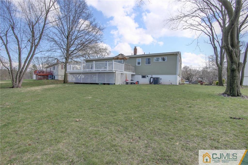 5 McEvoy Road Edison, NJ 08837 - Photo 22 of 22 a view of a back yard of the house