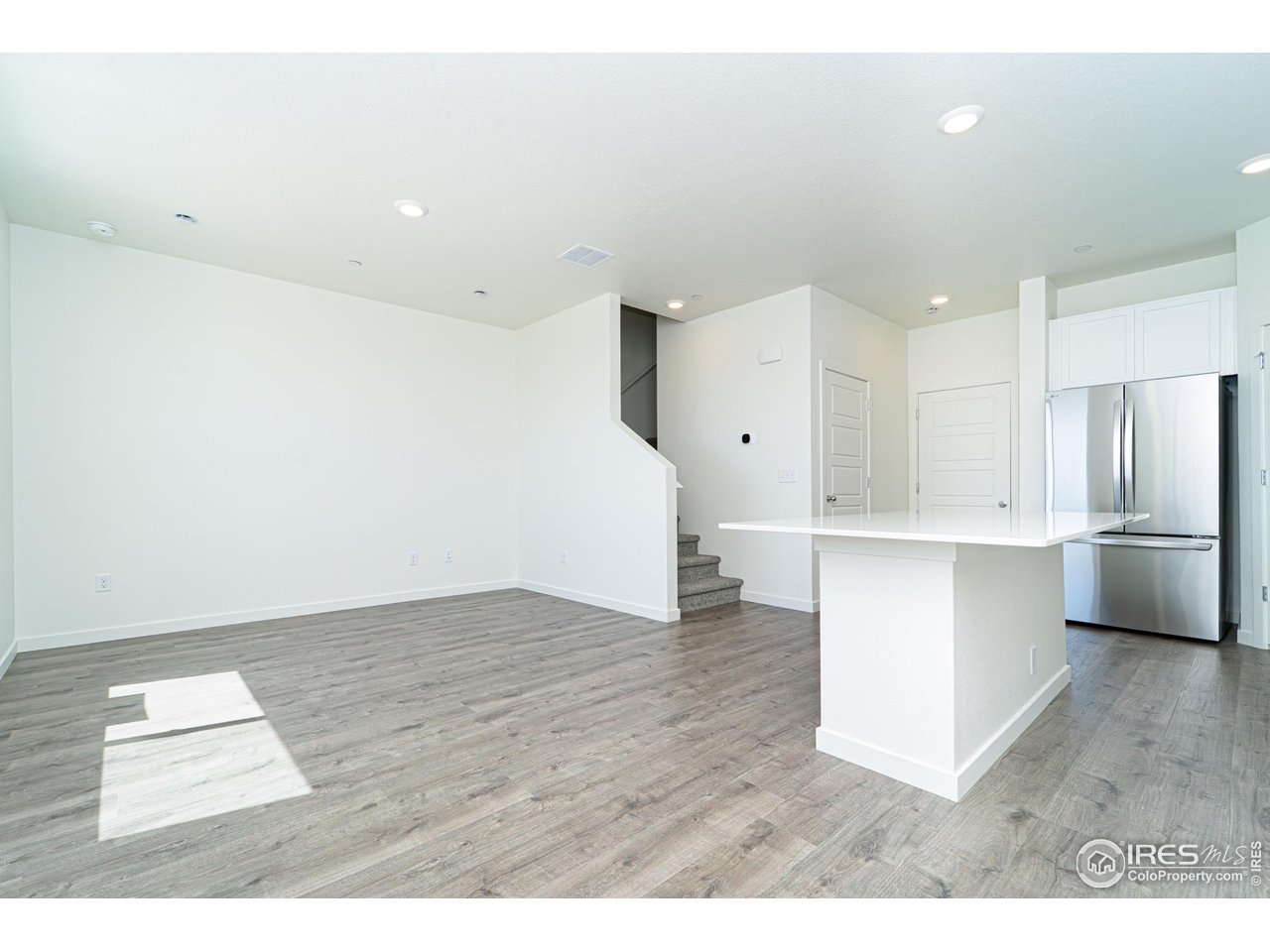 3909 Net Street Evans, CO 80620 - Photo 3 of 16 Kitchen/Livingroom