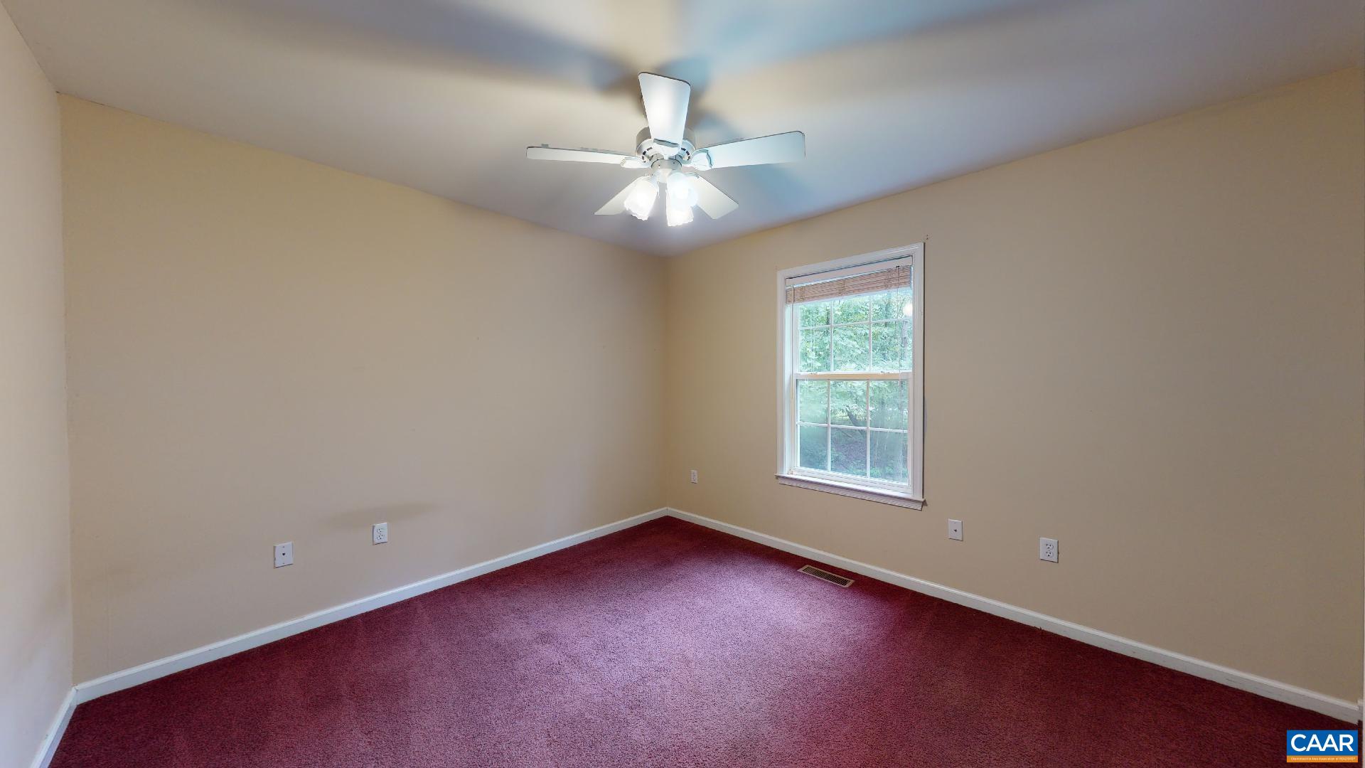 5 Haversack Road Palmyra, VA 22963 - Photo 15 of 25 an empty room with a window and a fan