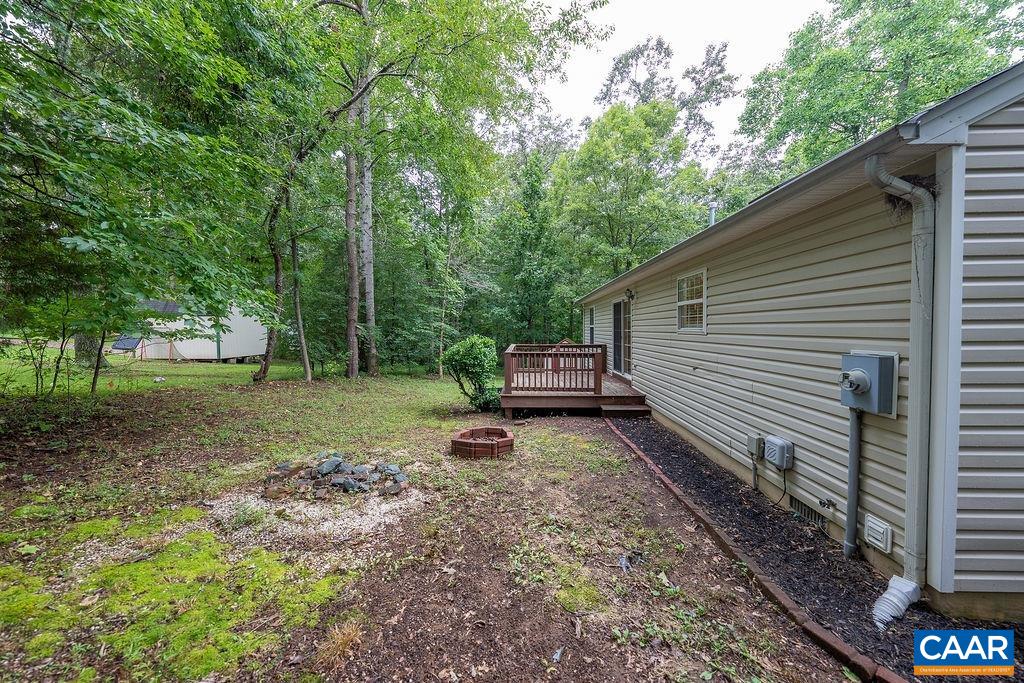 5 Haversack Road Palmyra, VA 22963 - Photo 19 of 25 a backyard of a house with lots of green space
