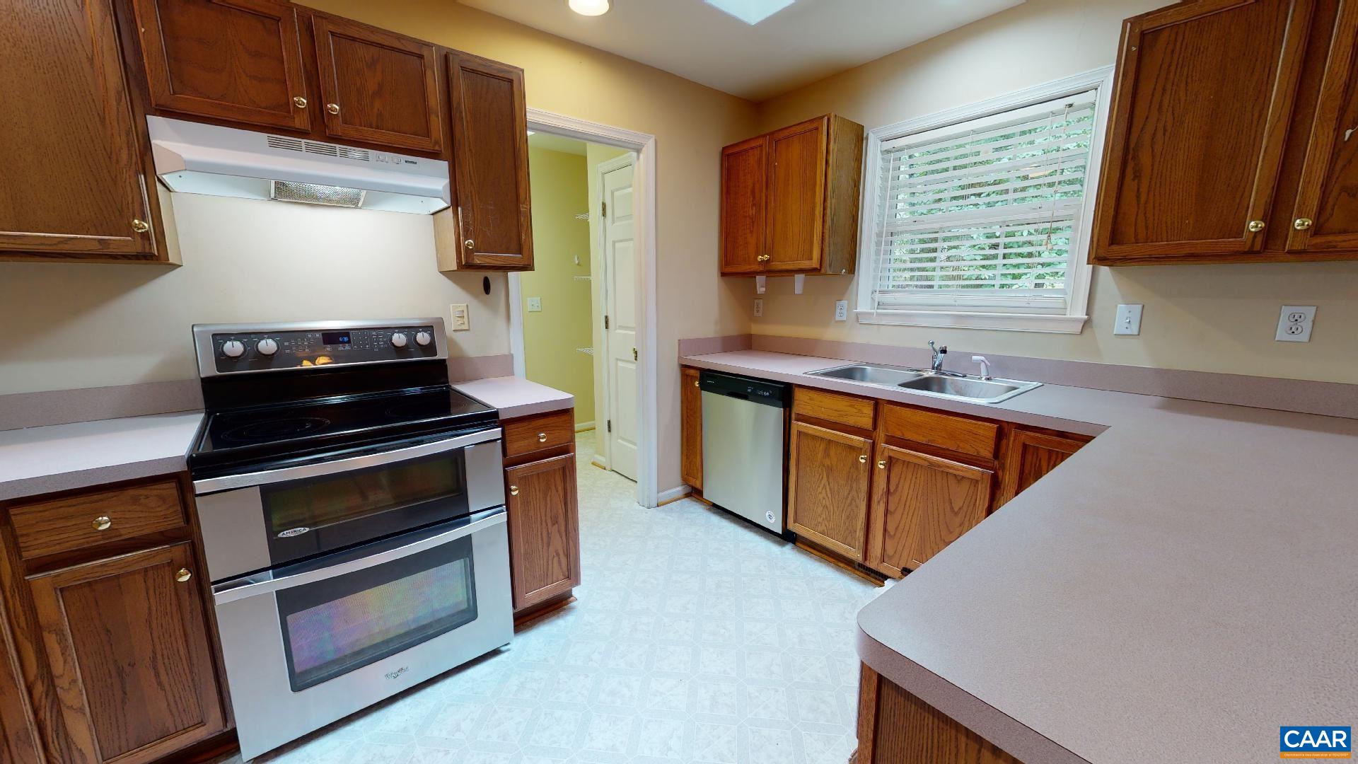 5 Haversack Road Palmyra, VA 22963 - Photo 7 of 25 a kitchen with stainless steel appliances a stove a sink and cabinets