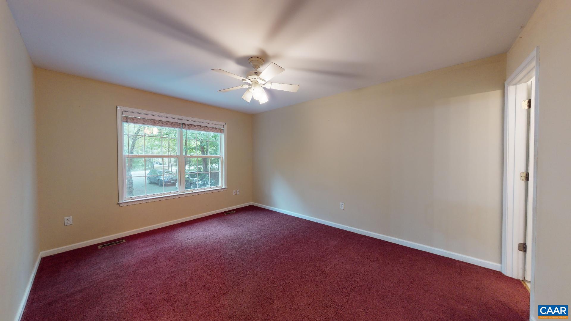 5 Haversack Road Palmyra, VA 22963 - Photo 9 of 25 an empty room with windows and fan