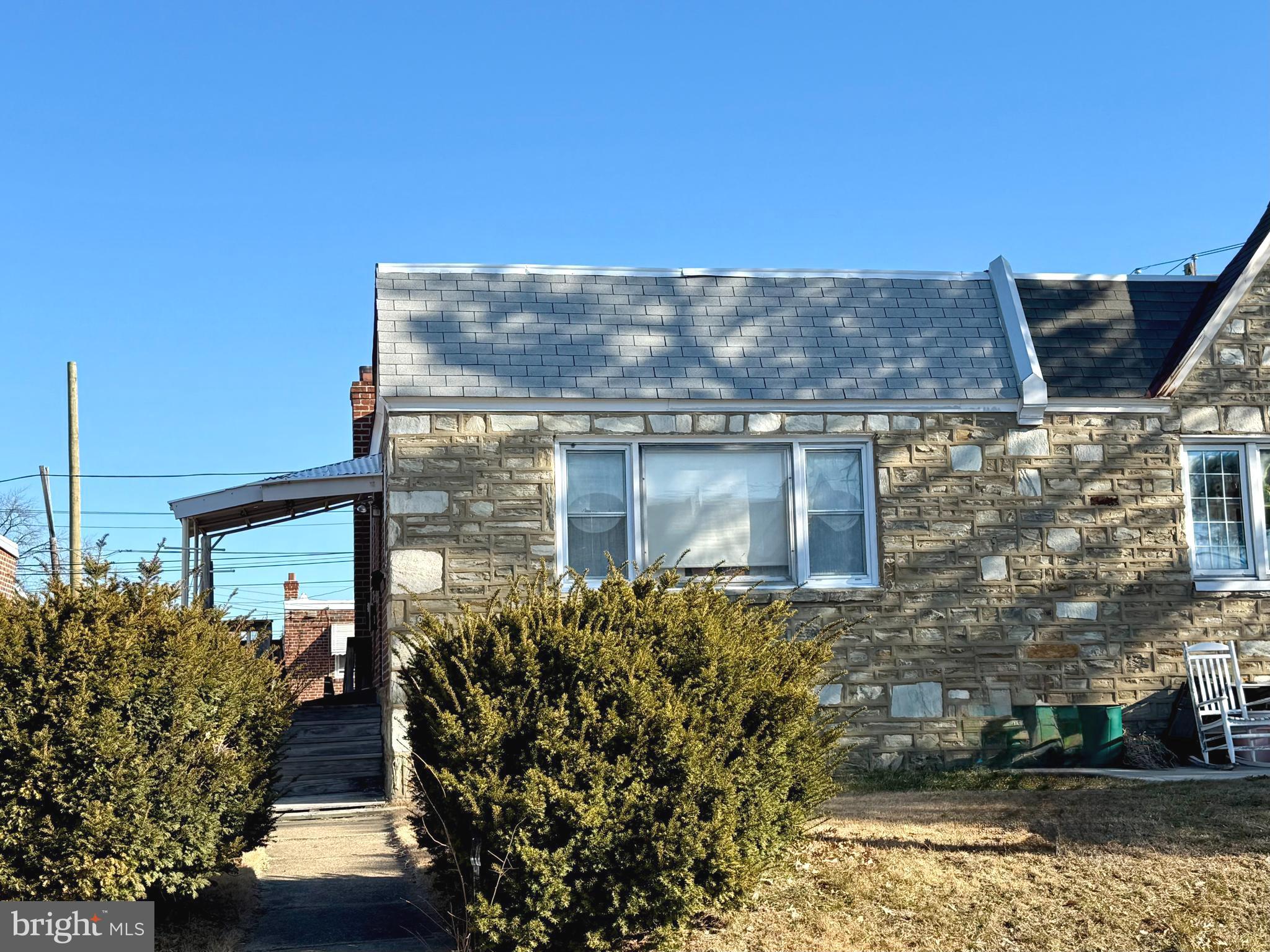 1629 Strahle Street Philadelphia, PA 19152 - Photo 1 of 2 front view of a house with a yard