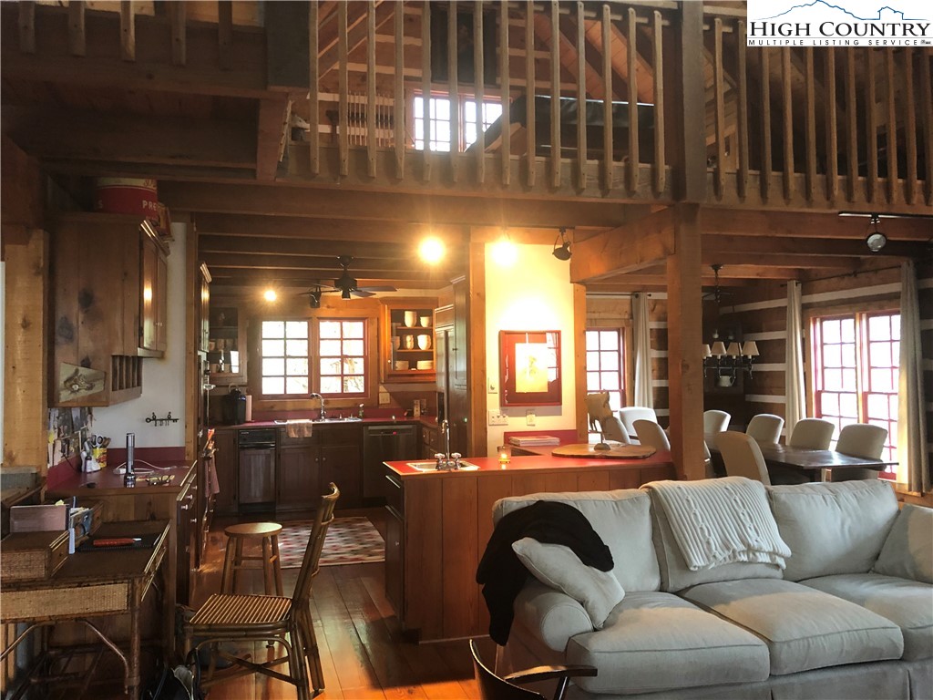 127-129 Rim Rock Gorge Road Blowing Rock, NC 28605 - Photo 3 of 15 a view of a dining room with furniture