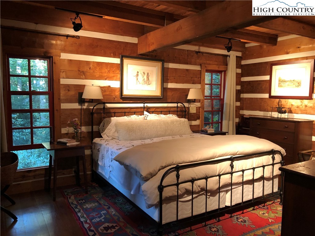 127-129 Rim Rock Gorge Road Blowing Rock, NC 28605 - Photo 4 of 15 a bedroom with bed and window