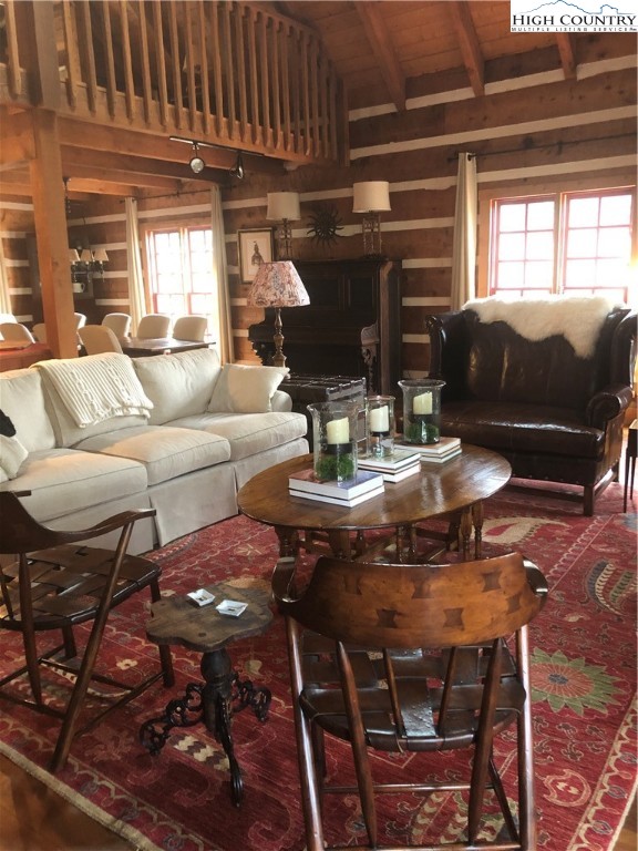 127-129 Rim Rock Gorge Road Blowing Rock, NC 28605 - Photo 6 of 15 a living room with furniture a table and a window