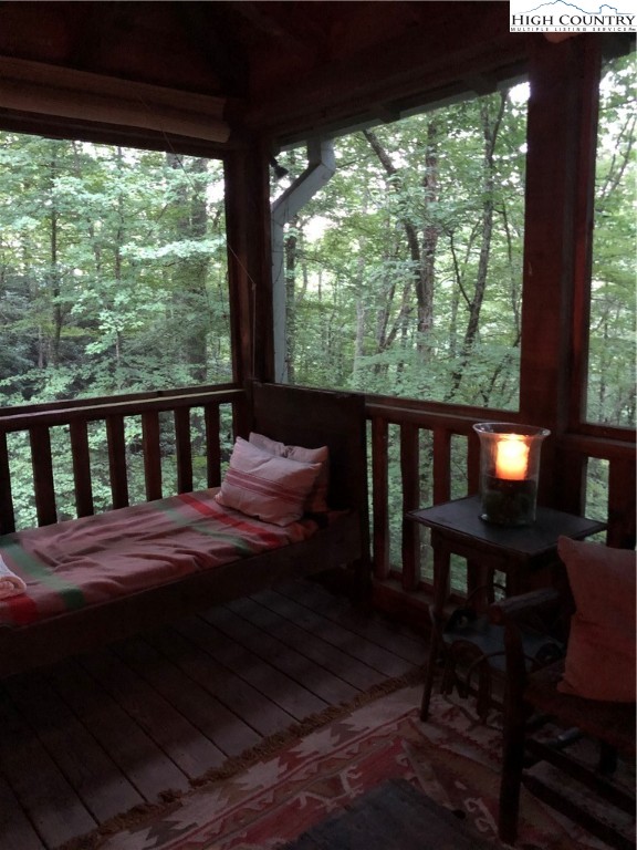 127-129 Rim Rock Gorge Road Blowing Rock, NC 28605 - Photo 10 of 15 a view of balcony with furniture