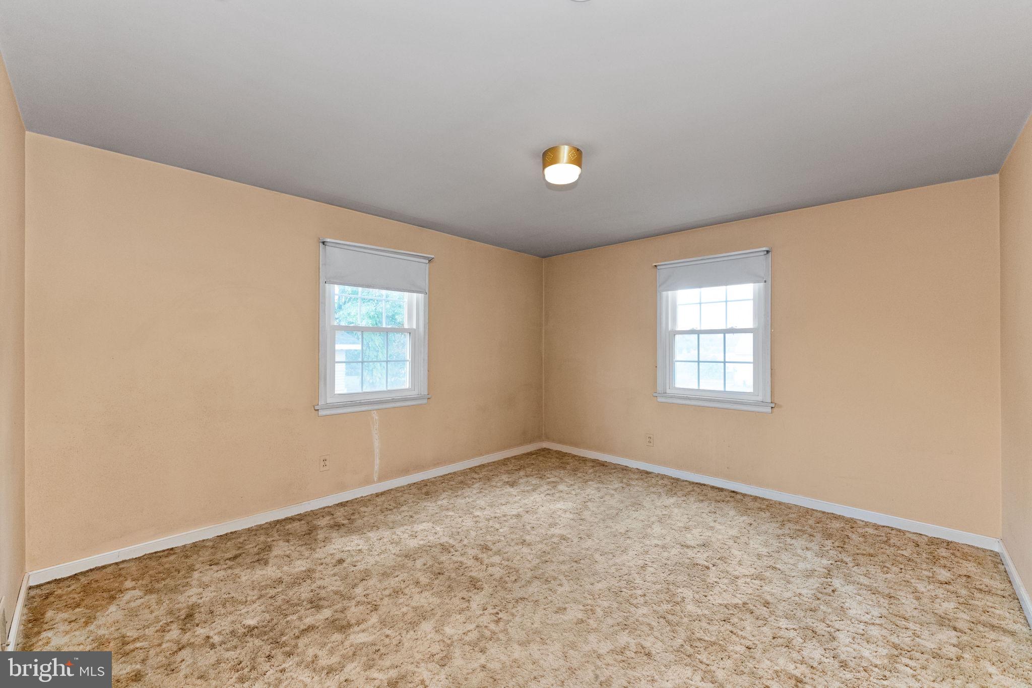 108 Jackson Road Gilbertsville, PA 19525 - Photo 13 of 29 an empty room with a empty space and window