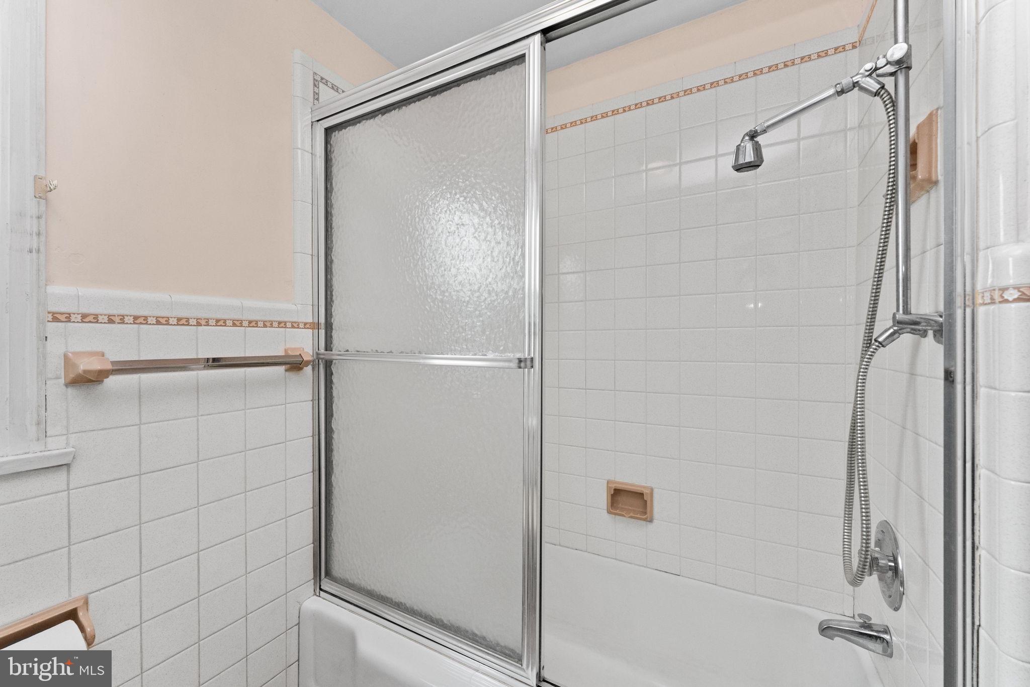 108 Jackson Road Gilbertsville, PA 19525 - Photo 18 of 29 a bathroom with a glass shower door