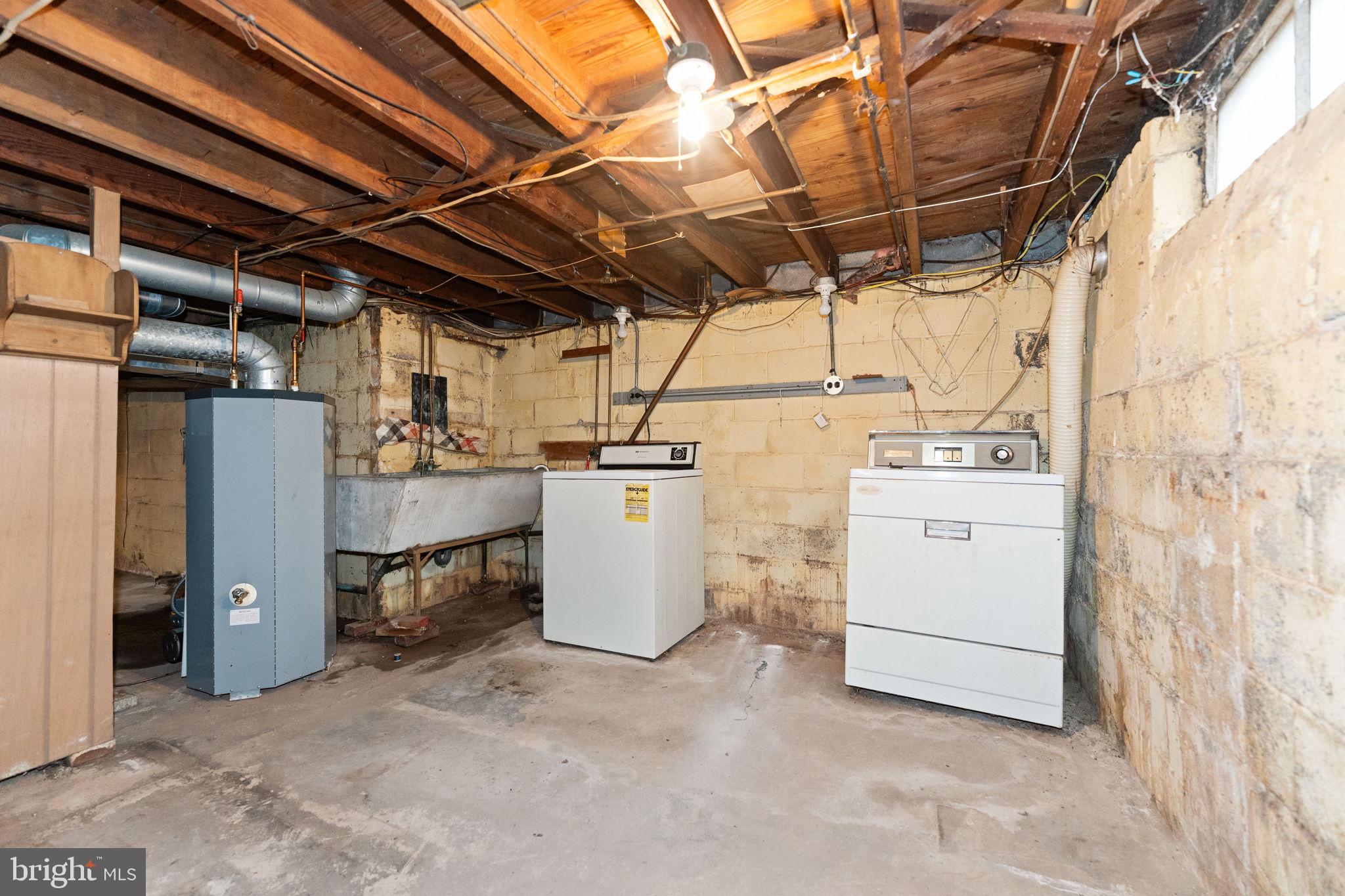108 Jackson Road Gilbertsville, PA 19525 - Photo 23 of 29 a view of a storage & utility room with washer and dryer