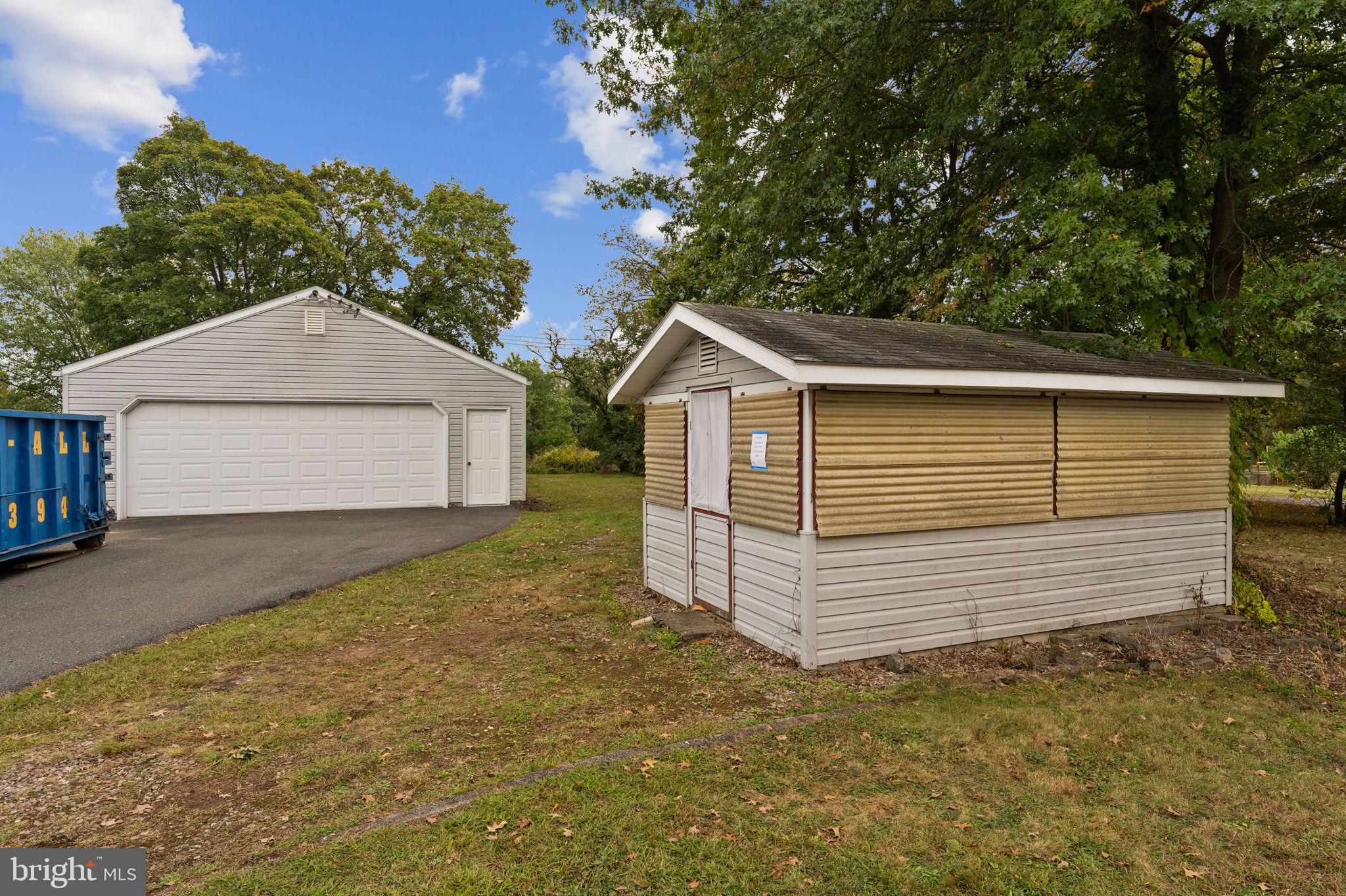 108 Jackson Road Gilbertsville, PA 19525 - Photo 25 of 29 a front view of a house with a garage