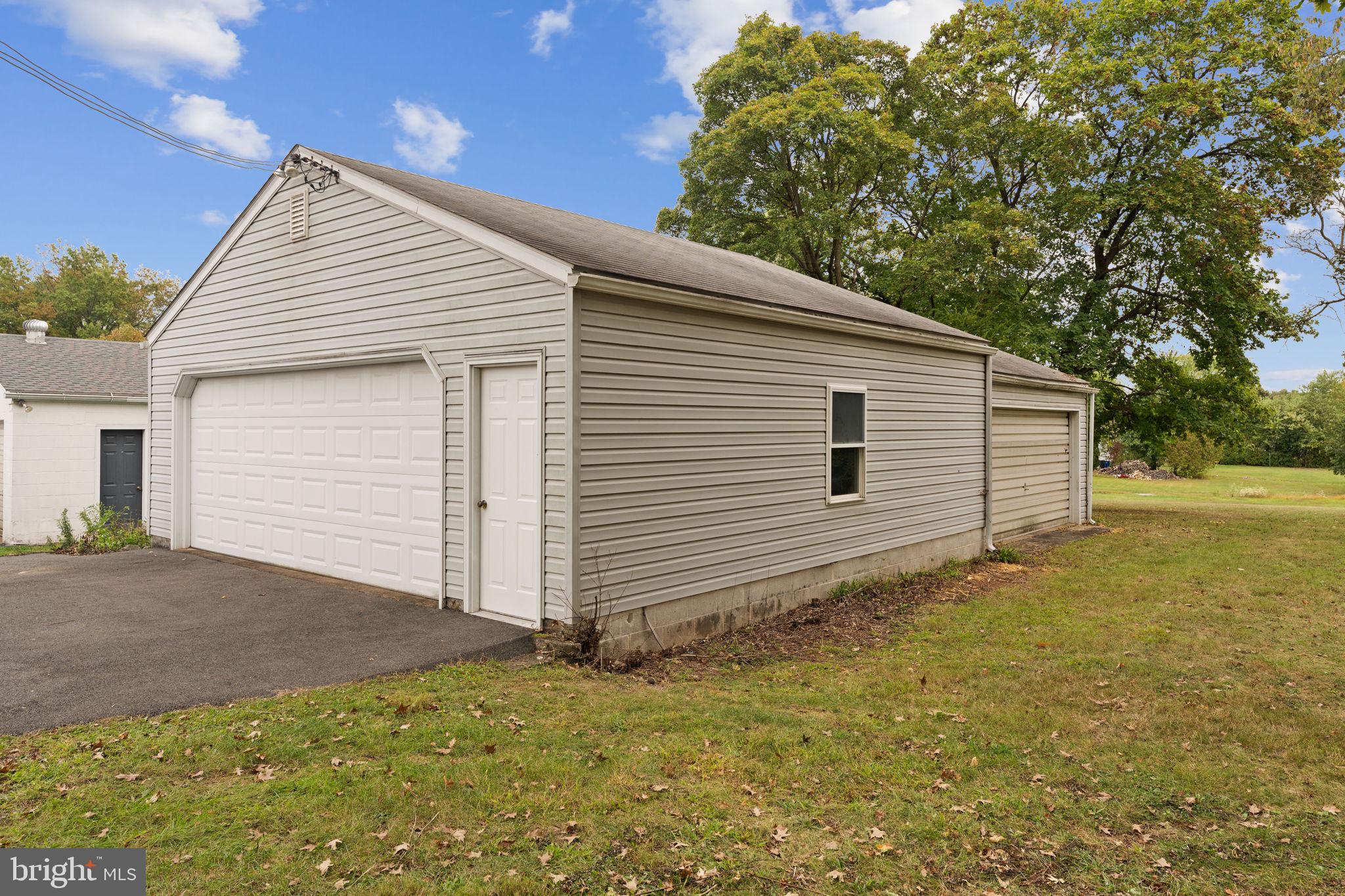108 Jackson Road Gilbertsville, PA 19525 - Photo 26 of 29 a view of backyard of house and garage