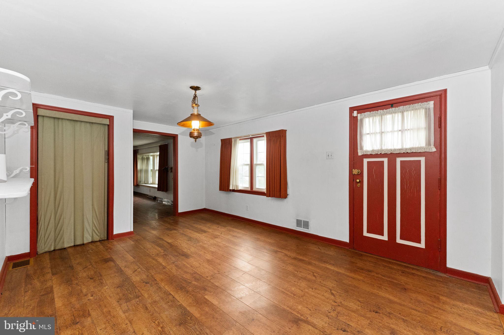 108 Jackson Road Gilbertsville, PA 19525 - Photo 5 of 29 a view of empty room with wooden floor and fan