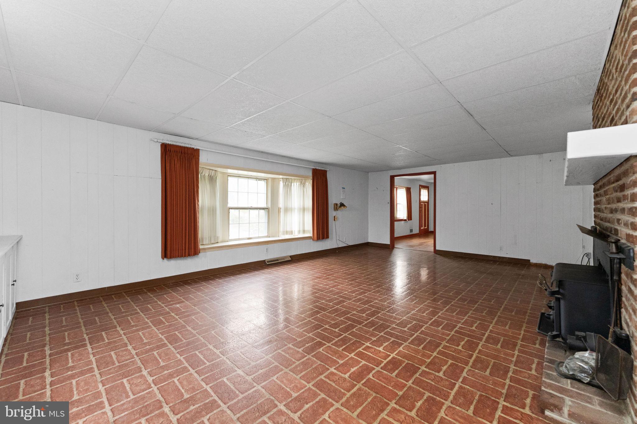 108 Jackson Road Gilbertsville, PA 19525 - Photo 9 of 29 a view of empty room with windows