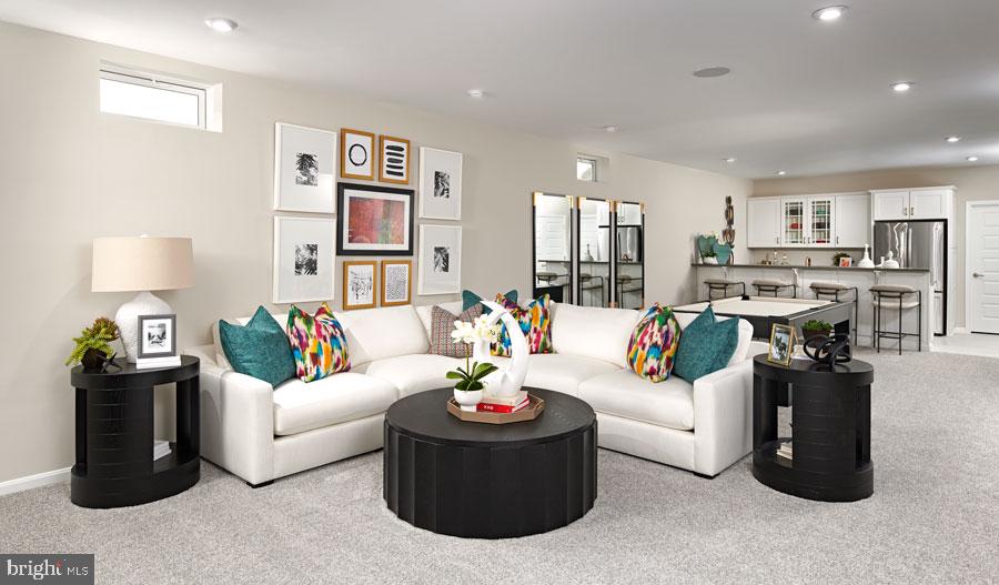 19004 Amesbury Road Hagerstown, MD 21742 - Photo 4 of 16 a living room with furniture and a couch