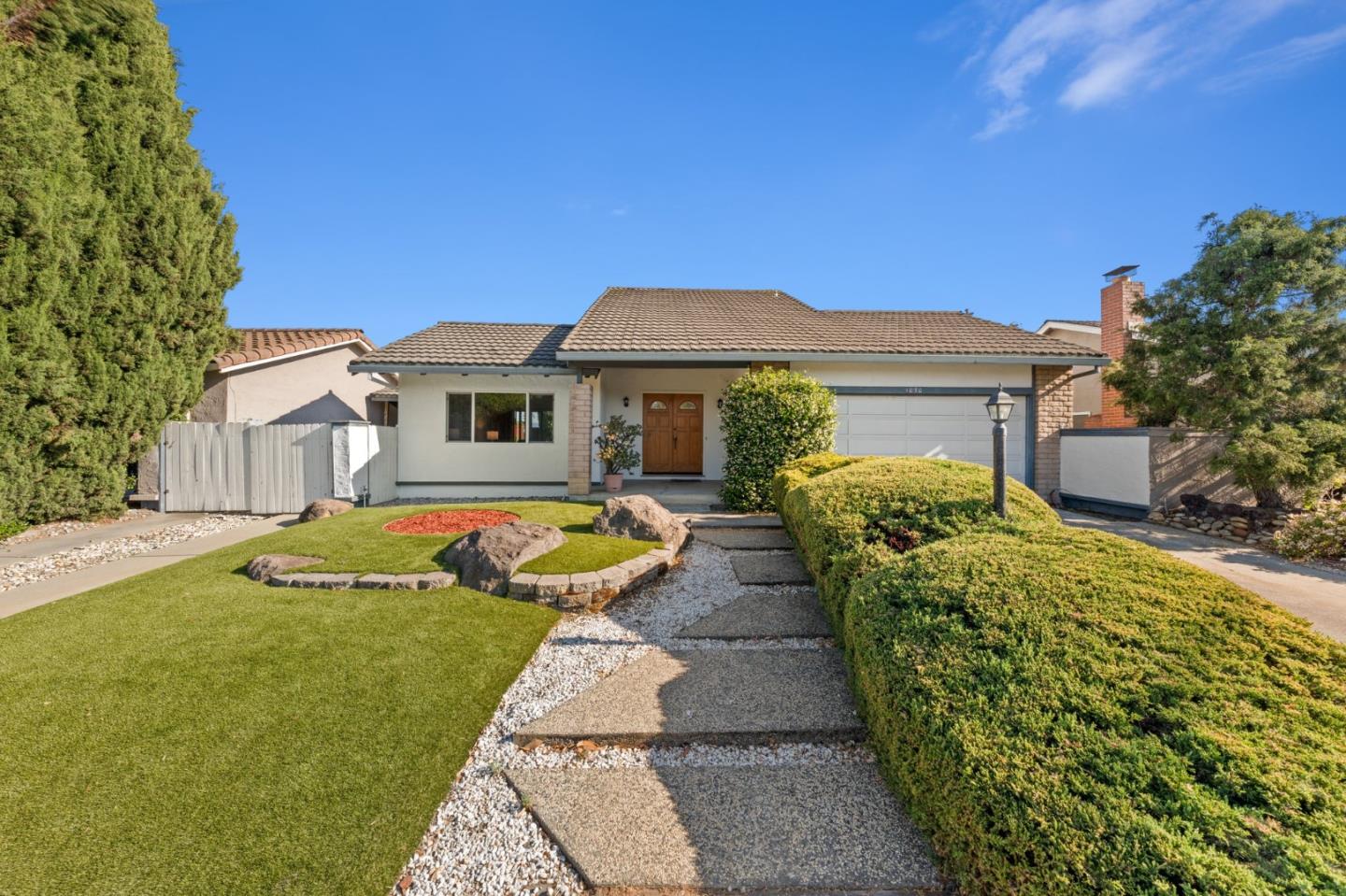 1070 Castleton Way Sunnyvale, CA 94087 - Photo 1 of 2 a front view of a house with swimming pool