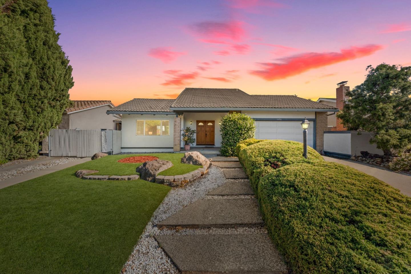 1070 Castleton Way Sunnyvale, CA 94087 - Photo 2 of 2 a front view of a house with a yard