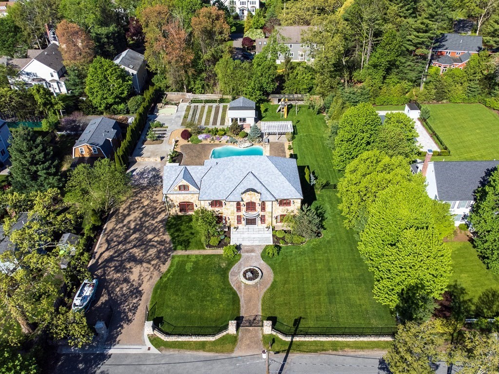 an aerial view of a house with a garden
