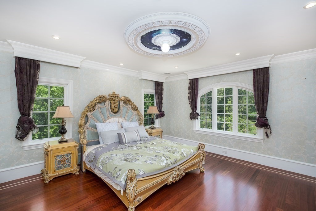 7 Evergreen Avenue Weston, MA 02493 - Photo 15 of 42 a bedroom with a bed and a window
