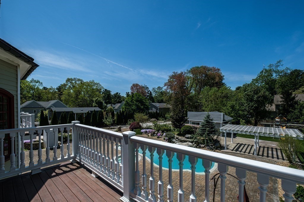 7 Evergreen Avenue Weston, MA 02493 - Photo 16 of 42 a view of a balcony with wooden fence