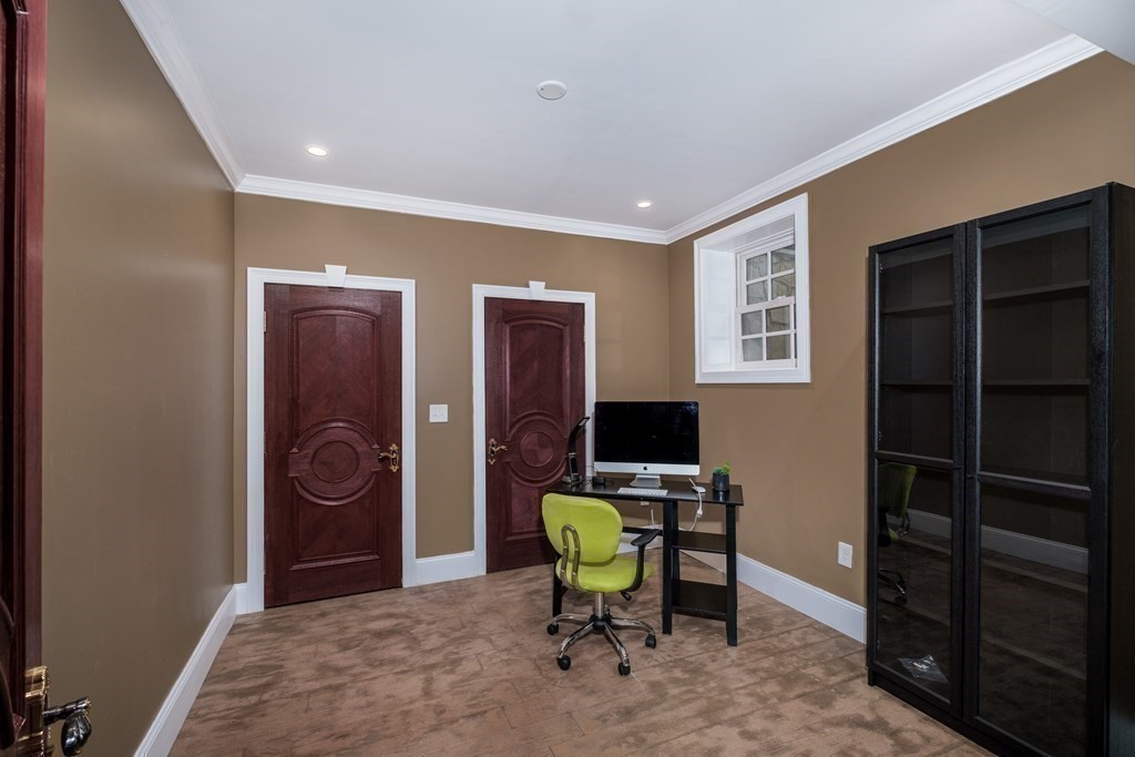 7 Evergreen Avenue Weston, MA 02493 - Photo 28 of 42 a view of a workspace with furniture and a window