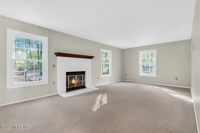 a view of a windows and a fireplace in an room