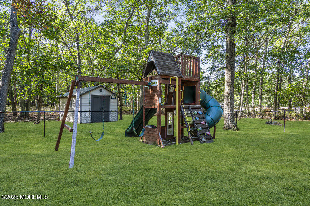 426 Basso Street Jackson, NJ 08527 - Photo 10 of 11 a view of a house with a park